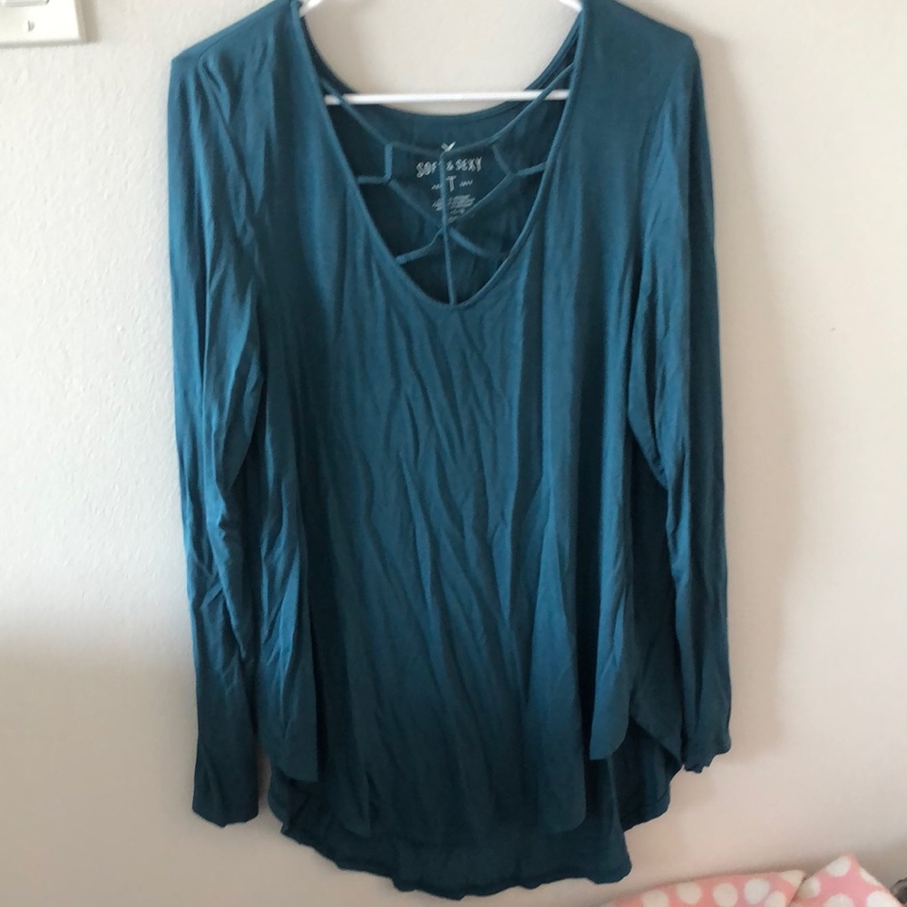 Long sleeve teal top with cut out neckline